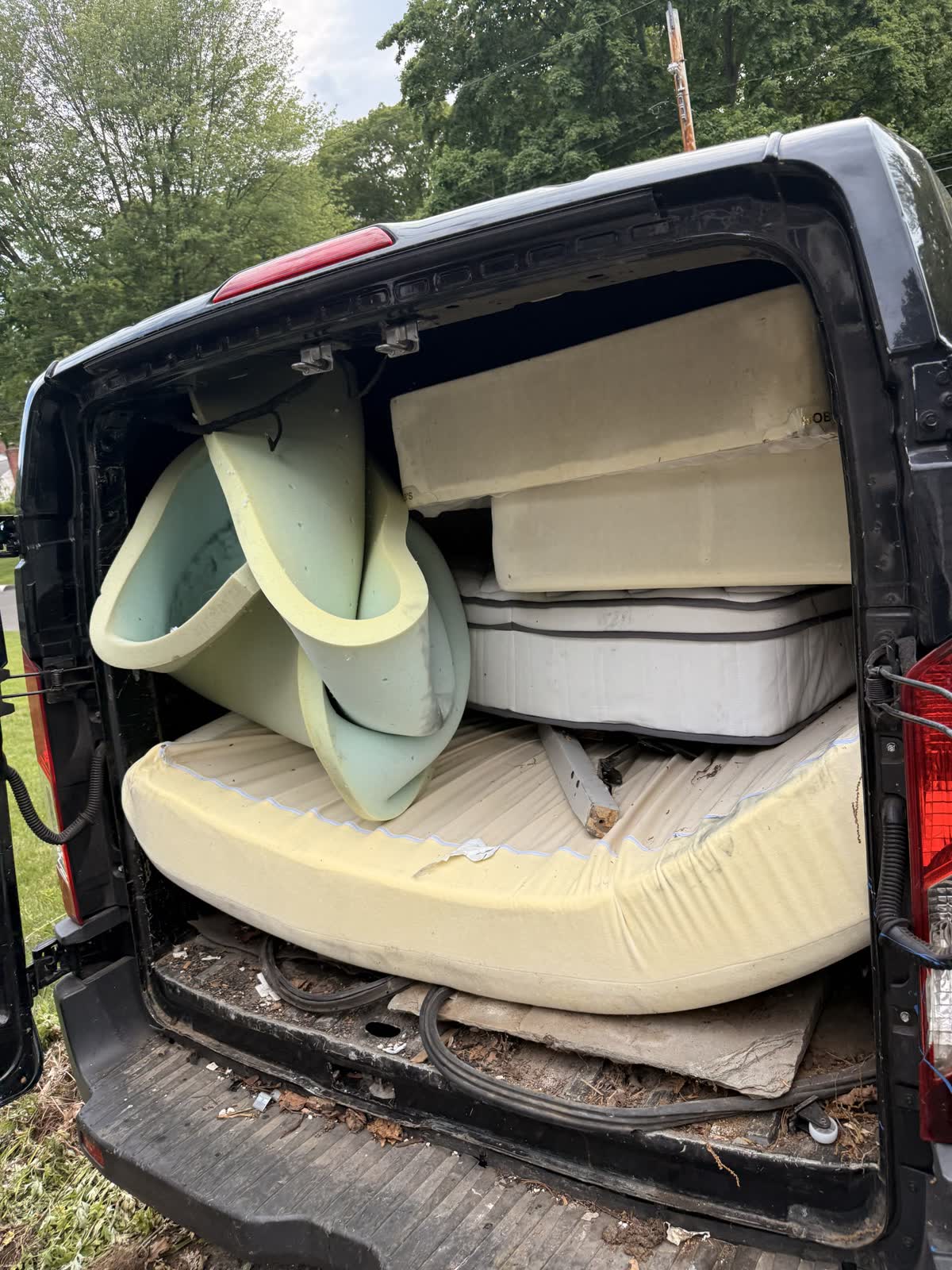 Household furniture staged for haul-away, Fairfield County CT