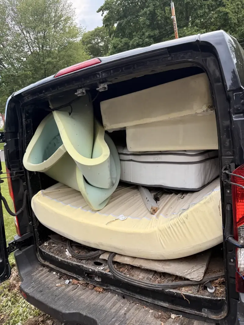 Household furniture staged for haul-away, Fairfield County CT